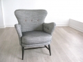 A black and white 1950s armchair